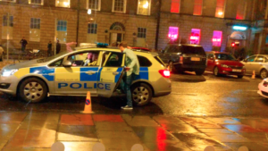 VIDEO: Incredibly drunk man in Scotland thought he could use a cop car as a taxi