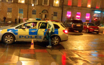 VIDEO: Incredibly drunk man in Scotland thought he could use a cop car as a taxi