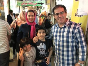 While visiting a bazaar near Tabriz, we met this nice family. Notice the little girl has a Metallica t-shirt! | Scenes from our Iran road trip | VincePerfetto.com