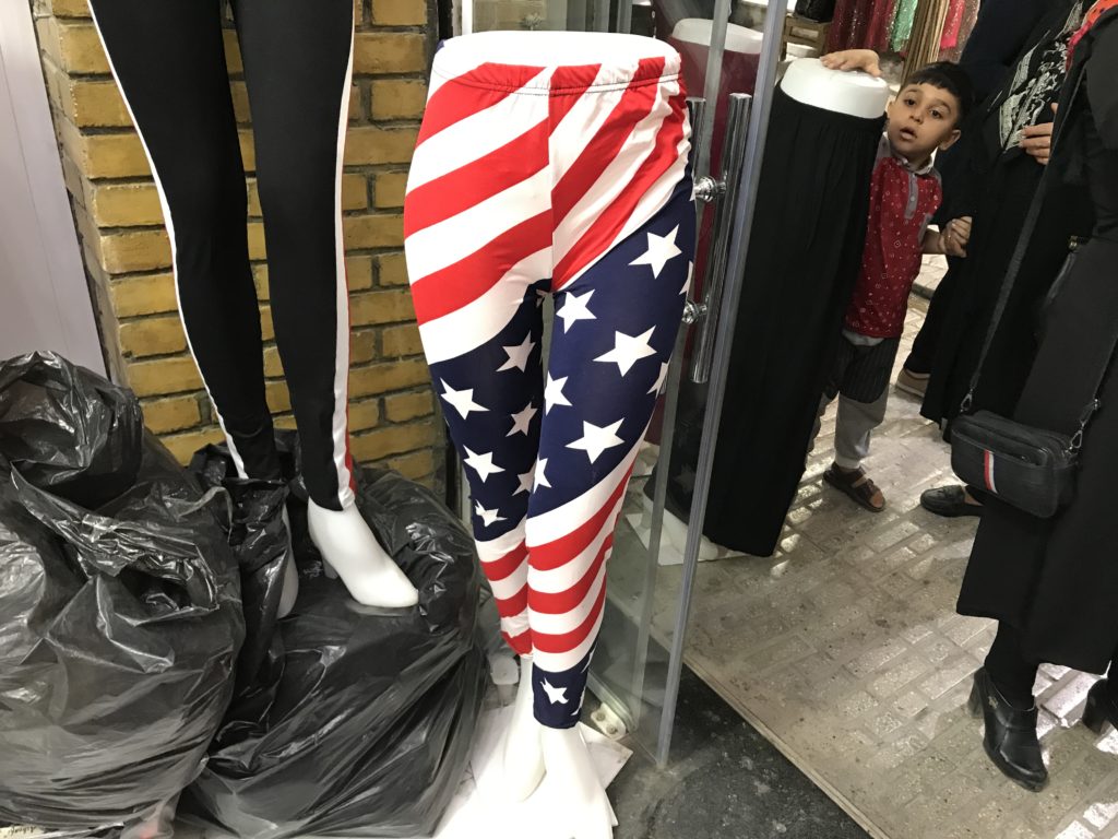 Before my visit, if you would've told me I'd see the American flag in Iran in a positive or even neutral light, I might've believed that I'd see a few. But only in very discreet times and places. I certainly never thought that I'd see the American flag on a pair of yoga pants. However, when we visited the Kermanshah Bazaar, there they were. The next time you see an Iranian woman wearing a burka or a chador, you never know - she just might wearing American flag yoga pants underneath! Perhaps the most incredible example. Pictures of the American flag inside Iran - and United States military merchandise, too! | VincePerfetto.com