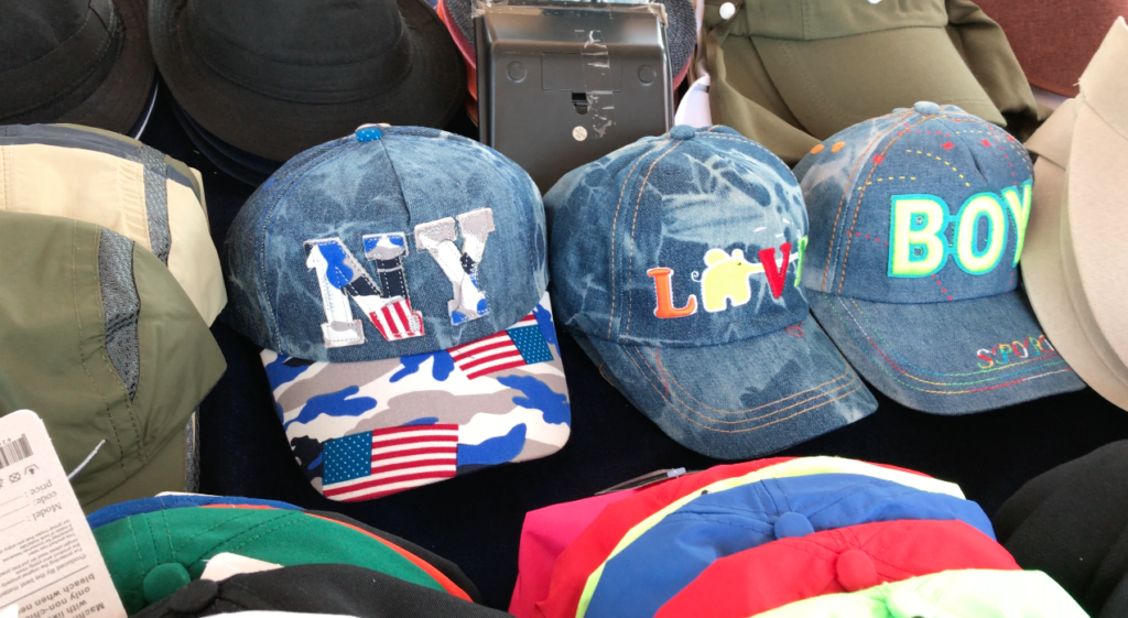 After we entered the #1 tourist attraction in Iran, Persepolis, I spotted this New York hat with American flags | VincePerfetto.com